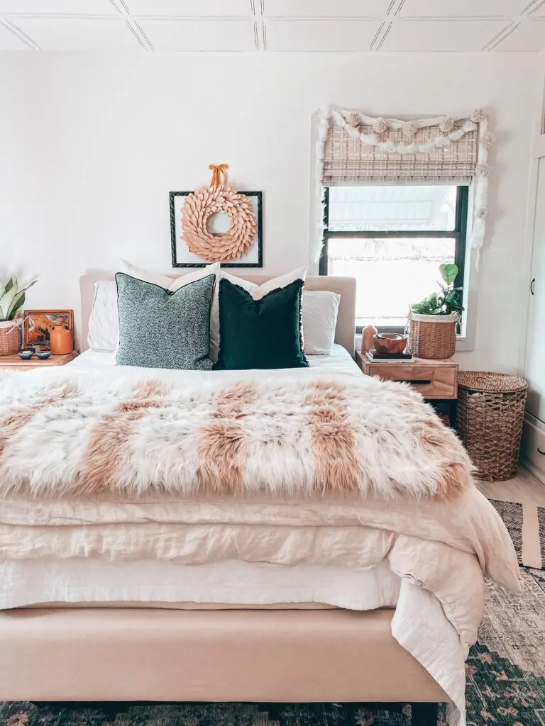 Bedroom with Christmas wreath on wall