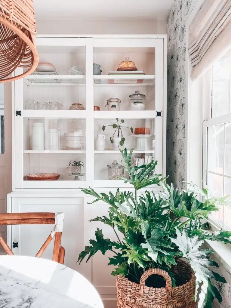 china cabinet white with plant