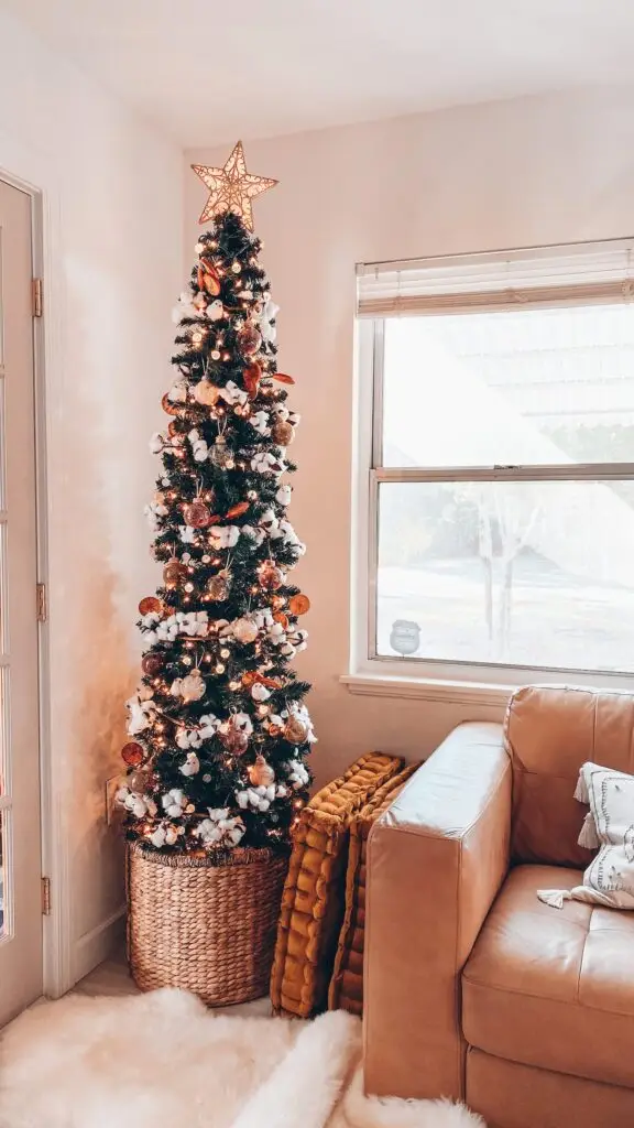 Christmas tree next to couch