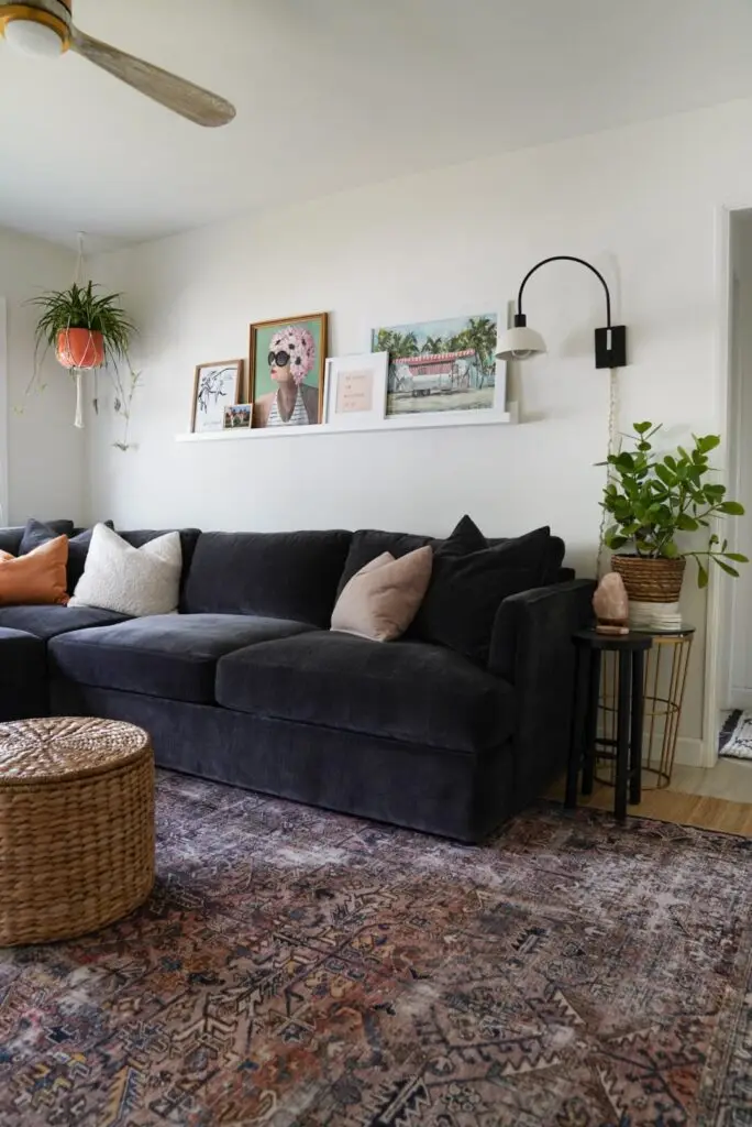 living room with dark sofa