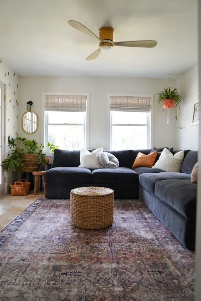 living room with dark sofa