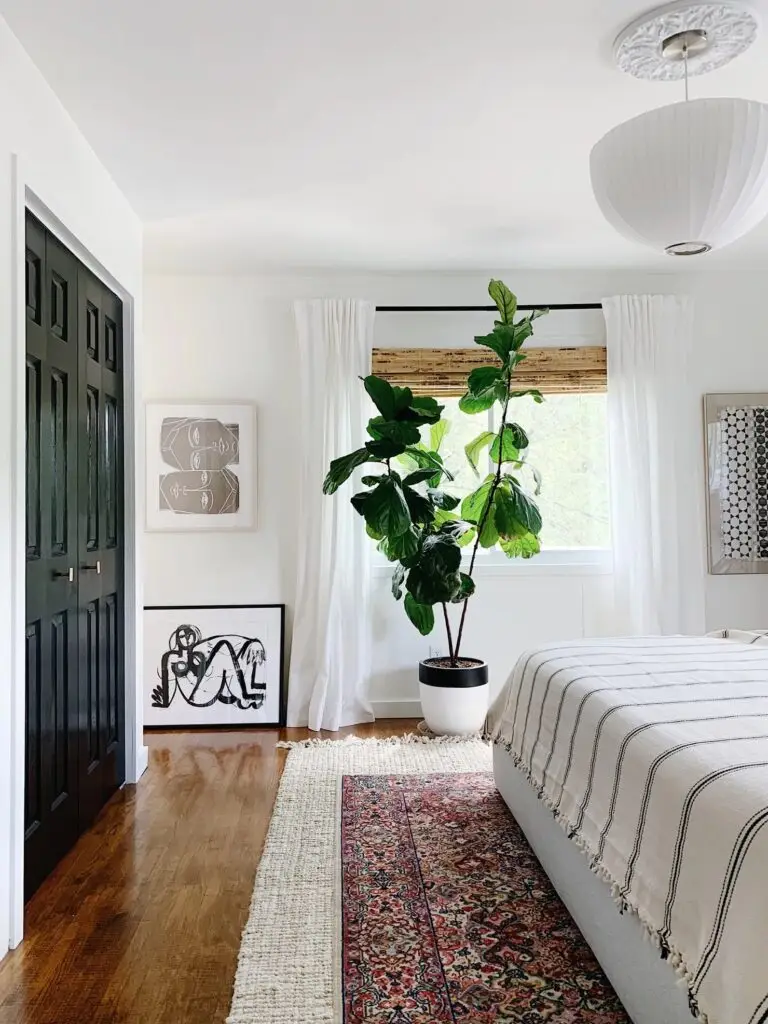 bedroom with rugs and bed