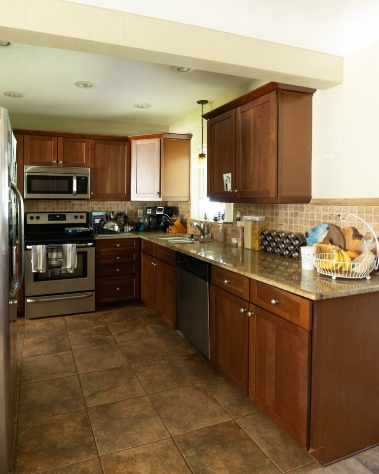 Modern Kitchen with Brown Granite Countertops - Blushing Bungalow | So ...